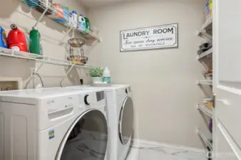 Modernized laundry area with new washer & dryer offer added convenience.