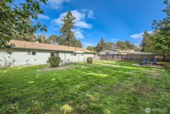Massive grassy yard is sure to be a favorite attribute of this property