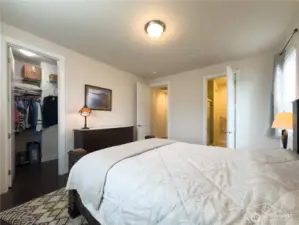 The primary bedroom boasts a walk-in closet and private 3/4 tiled bathroom.