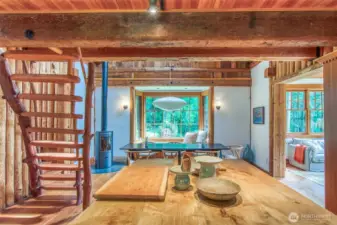 The kitchen opens to a vaulted great room, creating a seamless and spacious layout.