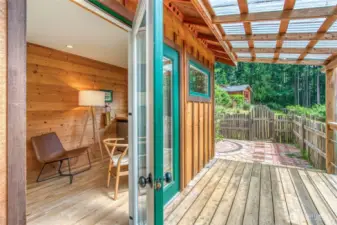 The large deck leads to a BBQ area for entertainment and relaxation.