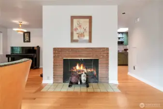 Cozy up to the period brick fireplace on cool evenings.