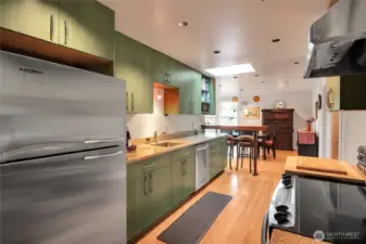 Stainless-steel KitchenAid refrigerator & dishwasher, & GE Profile range