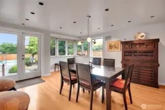 Wrap-around windows overlook the back yard.