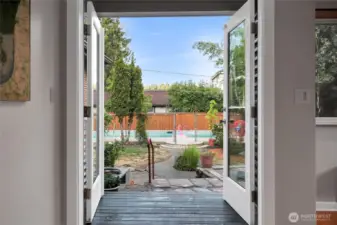 Open French doors for easy outdoor entertaining.
