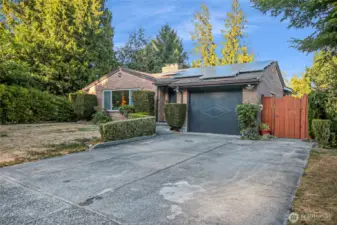 Attached garage + driveway parking