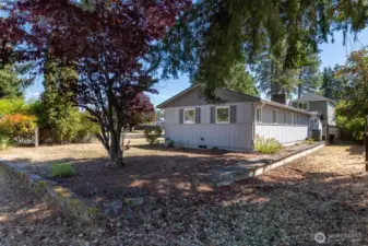 This is a large corner lot. Seen here to the right of the concrete sidewall is the second parcel. A perfect size for an RV or additional parking!