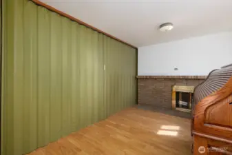 A view from the dining room area with the partition closed. The desk will be removed from the house!