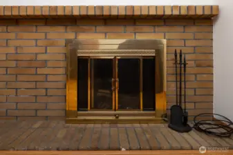 The wood fireplace tools stay with the property!