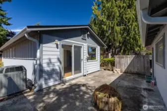 Slider door leads to patio. Imagine the entertaining you could do out here! Notice the fencing installed for privacy.