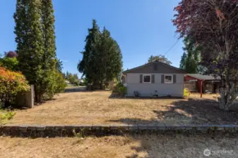 This is standing on the north side of the lot. So much potential for this huge yard!