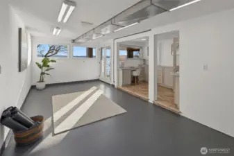 Expansive lower-level space ideal for a home gym, water toy storage, or even a future kitchenette - endless potential awaits.
