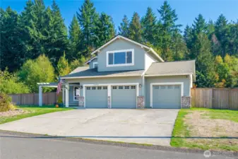 Generous driveway space for multiple vehicles