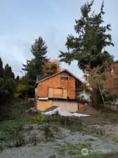 Current home can be torn down for a complete new build, plans included in sale (almost ready to submit to city for final permits) or Remodel current structure (plans are availabel for new floorplan dn remodel)
