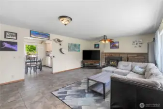 Large living room and cozy fireplace/wood stove