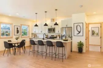Kitchen with dining area. Virtually staged.