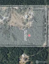 You will enter on 168th St E, the property will be on the right. Pink property line flags mark the line between Lot 1 and Lot 2. I did not see flags marking the East line.