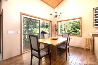 Separate dining area with direct access to covered deck.