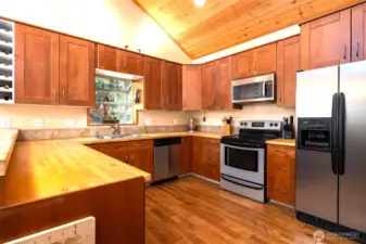 Large kitchen with lots of counter space and cabinets