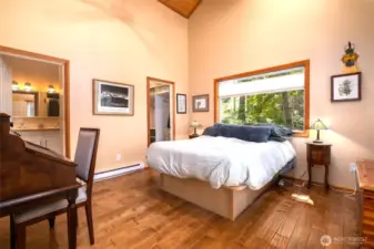 Primary bedroom with ensuite bathroom and walk in closet.