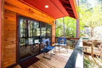Covered deck off primary bedroom