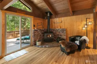 Newer Blake King wood stove adds warmth and character. The double slider leads to the expansive back deck.