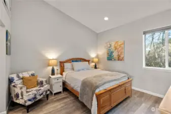 Bedroom in apartment with vaulted ceilings