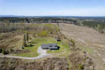 Peaceful forested views and open space surround the home—your private escape.