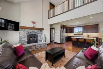 The open layout connects the living room to the kitchen, ideal for entertaining guests.