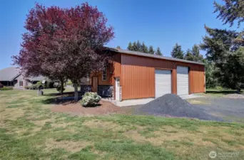 36x48 Shop w 2 man doors  , 2 roll up doors 1 for rv