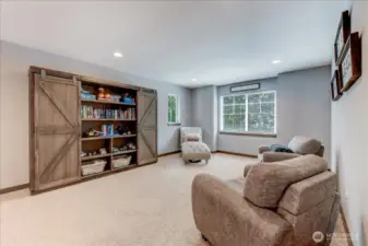 Huge loft area just off the bedrooms. Great space to relax and watch a movie!