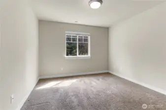 Bedroom two has a large window overlooking the front yard and the neighborhood park which is located directly across the street.