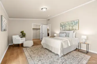 Inviting layout with warm flooring, soft tones, and seamless access to the walk-in closet.