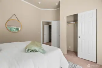 At the end of the hall, you’ll find two generously sized bedrooms—each with double-door sliding closets for easy storage and organization.