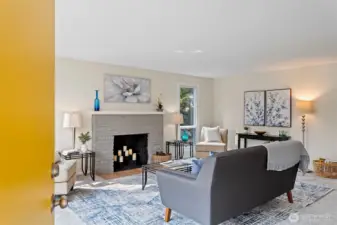 Step inside to a surprisingly spacious living room—calm tones, new carpet, and wide sightlines.