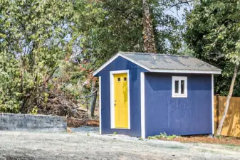 This charming outbuilding isn’t just cute—it’s been thoughtfully renovated to match the home, right down to the Goldfinch-yellow door. The seller invested over $10K in its transformation: new siding, window, door, a freshly painted metal roof, and professionally cleared and graded grounds. More than a facelift, it’s ideal for storage, hobbies, or a future she-shed.