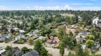 A central, tucked-in location with mature trees, privacy, and a surprisingly spacious lot—right in the heart of it all.