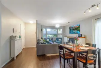 This view is taken from where the hall enters into the living and dining room and shows the entryway.