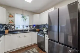 New single basin sink, touch faucet and backsplash, too!