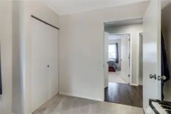 Looking out of the third bedroom into the hall.