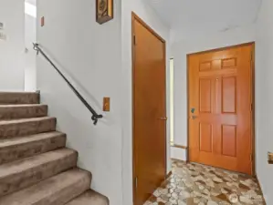 As you head upstairs to the main level, you'll notice the abundance or storage.