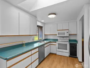 The kitchen offers a ton of storage space.