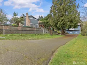 The long driveway with room on both sides is great for adding RV parking or space for your guests.