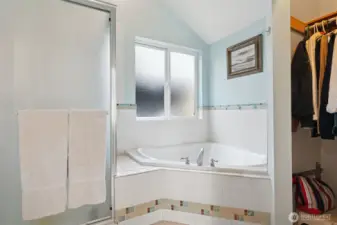 Primary Ensuite with jetted soaking tub & step in shower