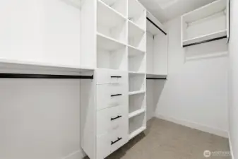 Primary walk-in closet.
