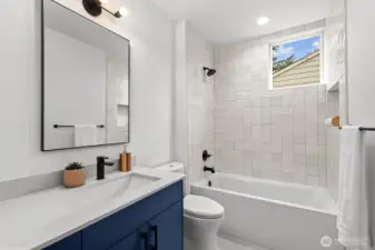Full bathroom off the 4th bedroom or media/rec room.