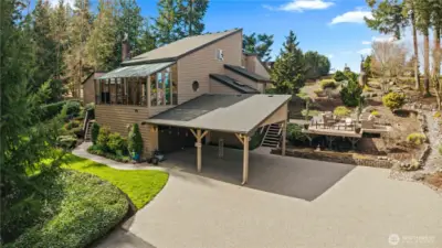 Experience Achitectural Elegance in this Lake Tapps home on 2 equestrian acres