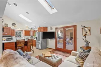 family room to kitchen & french doors to covered deck