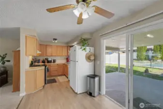 Kitchen and sliders to patio and pool area