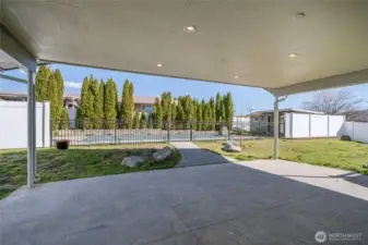 Cpvered patio and entrance to ool